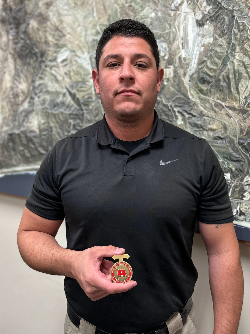DVIDS - Images - CG presents coins to Range Safety staff [Image 4 of 5]