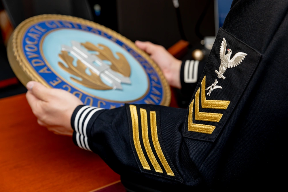 DVIDS - Images - Legalman Holds a Judge Advocate General’s Corps Insignia