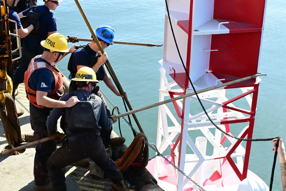 Aids to navigation crewmembers participate in the spin and hook event Oct. 23, 2024 during the annual Buoy Tender Round Up held in Portsmouth, Virginia.