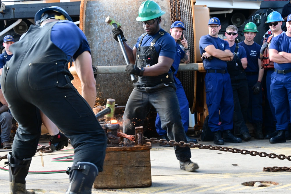 Aids to navigation crewmembers hit a pin during the heat and beat event, Oct. 23, 2024, during the annual Buoy Tender Round-up held in Portsmouth, Virginia. 