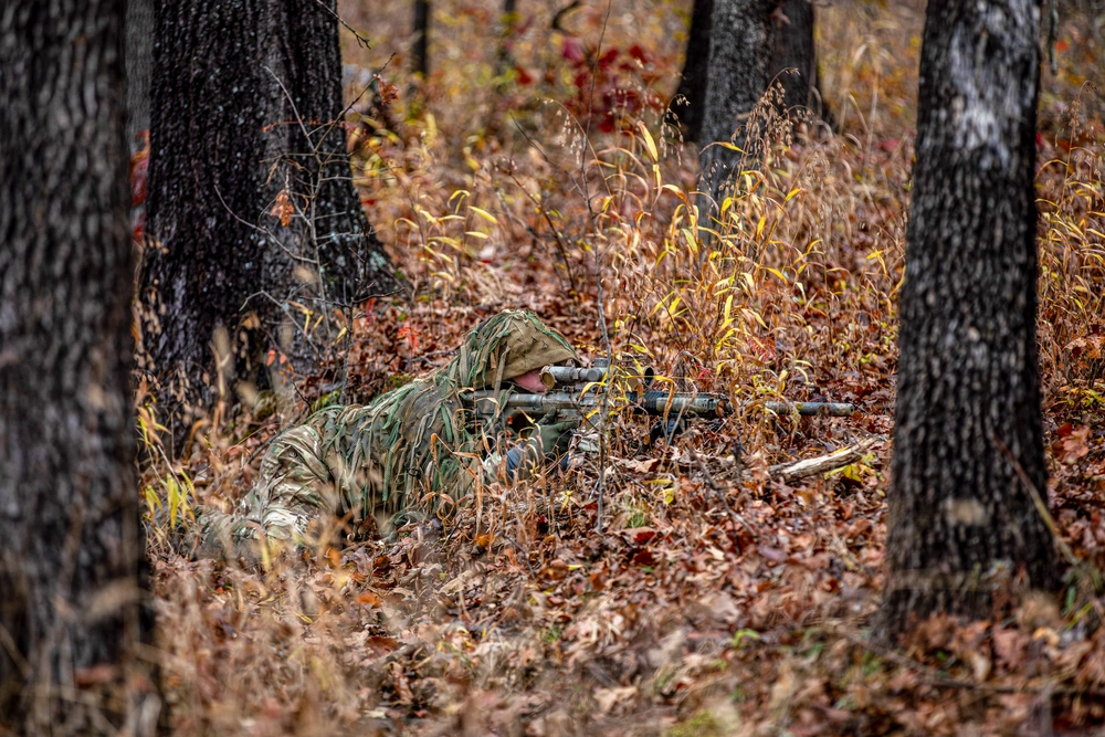 Competitors start the 54th WPW and 34th AFSAM Sniper Championship with an early morning as teams conduct the Stalk event at Fort Chaffee, Arkansas.