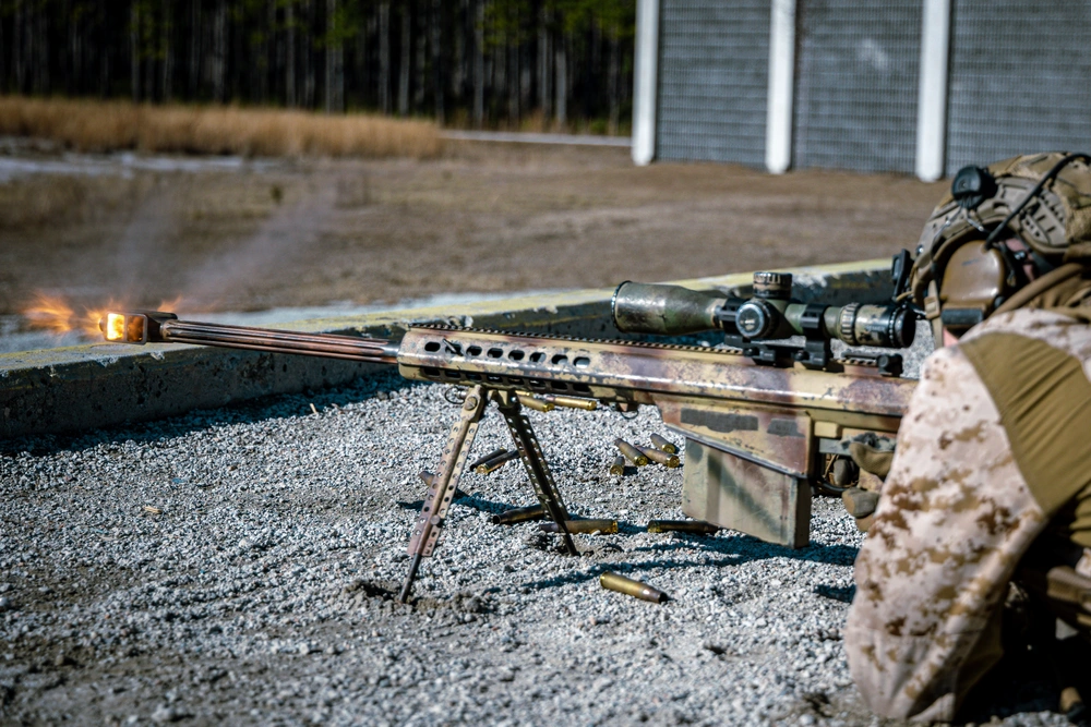 U.S. Marine Corps Lance Cpl. Grant Bulson fires an M107 .50-caliber special application scoped rifle (SASR) during a SASR live-fire range at Marine Corps Base Camp Lejeune, North Carolina, Jan. 9, 2025.