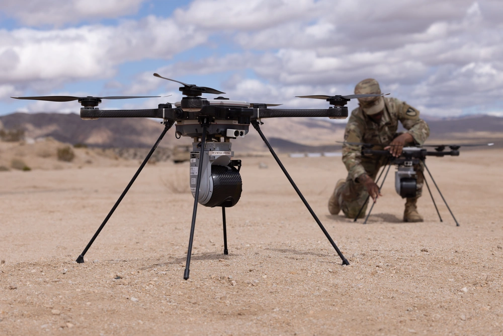 U.S. Army Staff Sgt. Jeremy Ephriam, assigned to 36th Engineer Brigade, prepares a Ground Obstacle Breaching Lane Neutralizer drone for launch during Project Convergence-Capstone 5 (PC-C5) on Fort Irwin, California, in March 2025. Army experimentation events such as PC-C5 are key opportunities for data collection and learning under ATEC’s Continuous Evaluation Campaign approach to test and evaluation.