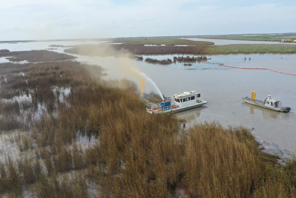 An overflight displays the affected area of marsh environment near Garden Island Bay, Louisiana on May 1, 2025. A safety zone has been enacted in the area and boom has been placed to contain the released product. (U.S. Coast Guard courtesy photo) An overflight displays the affected area of marsh environment near Garden Island Bay, Louisiana on May 1, 2025. A safety zone has been enacted in the area and boom has been placed to contain the released product. (U.S. Coast Guard courtesy photo)