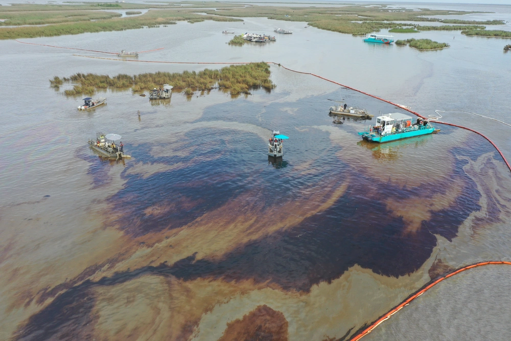 An overflight displays the affected area of marsh environment near Garden Island Bay, Louisiana on May 1, 2025. A safety zone has been enacted in the area and boom has been placed to contain the released product. (U.S. Coast Guard courtesy photo) An overflight displays the affected area of marsh environment near Garden Island Bay, Louisiana on May 1, 2025. A safety zone has been enacted in the area and boom has been placed to contain the released product. (U.S. Coast Guard courtesy photo)