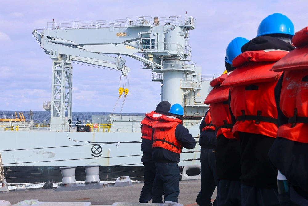 DVIDS - Images - U.S. Navy Sailors heave in the phone and distance line ...
