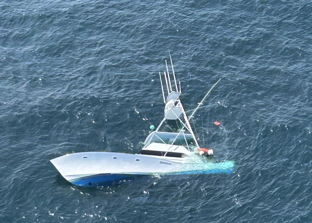 Two men are rescued by the USCGC Calhoun (WMSL 759) crew, June 12, 2025 from a life raft after their 57-foot sport fisher vessel, Turn Me Loose, sank 34 miles southeast of Virginia Beach, Virginia. Two men are rescued by the USCGC Calhoun (WMSL 759) crew, June 12, 2025 from a life raft after their 57-foot sport fisher vessel, Turn Me Loose, sank 34 miles southeast of Virginia Beach, Virginia.