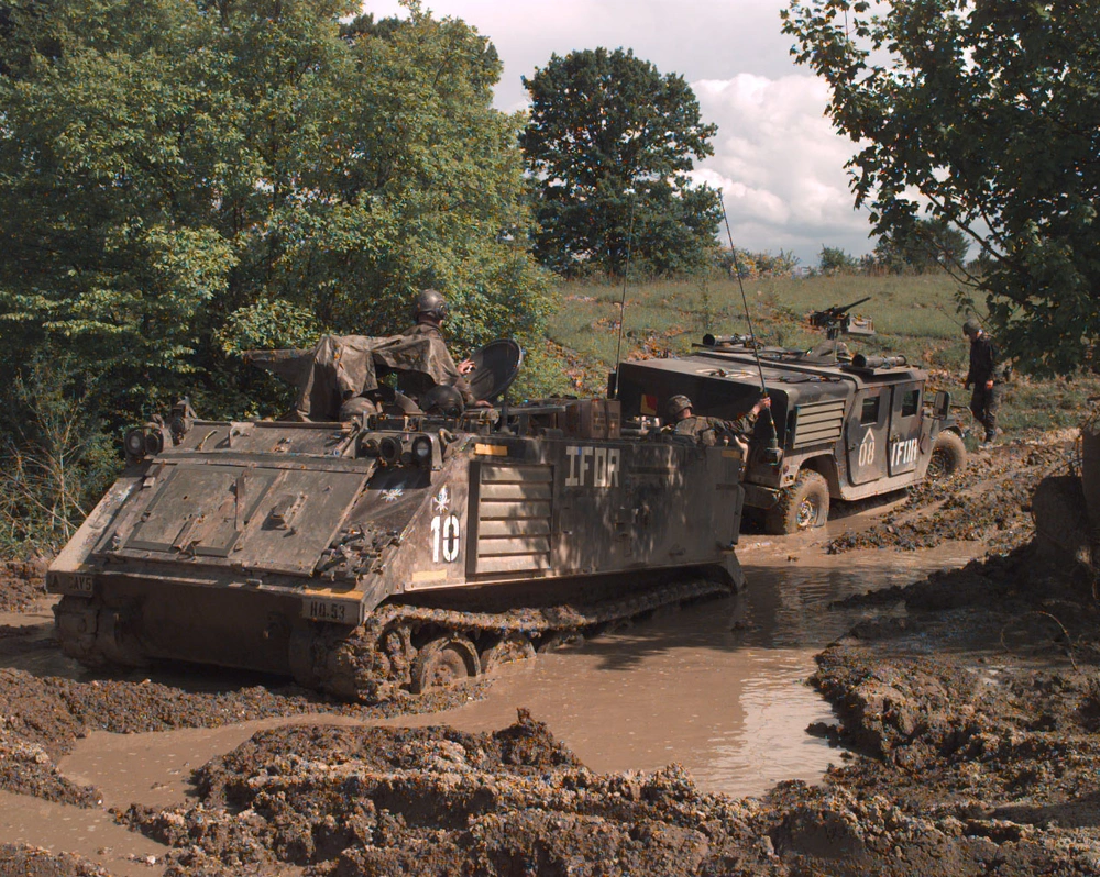 DVIDS - Images - A U.S. Army M-113 APC prepares to pull a Humvee out of ...