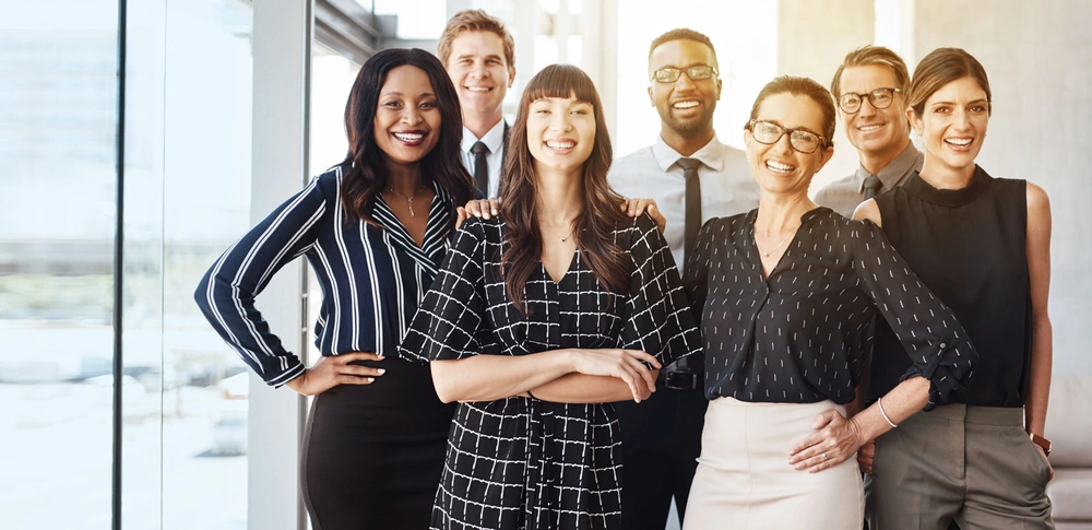 Group of professionals smiling at the camera