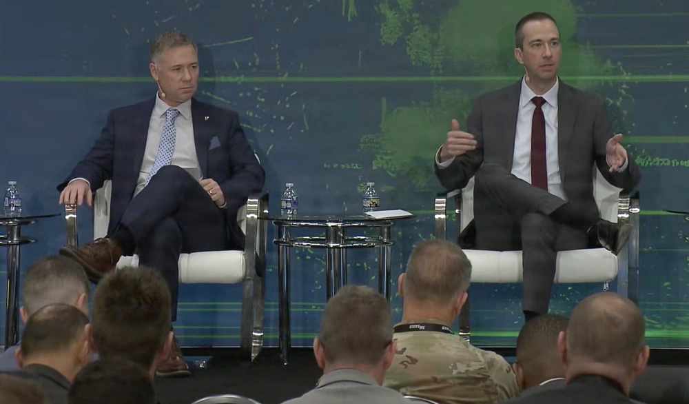 Hon. Brent G. Ingraham, left, assistant secretary of the Army for acquisition, logistics and technology and Joseph D. Welch, right, deputy to the commanding general, Army Futures Command, emphasizes that NGC2 should remain under checks and balances to avoid future challenges or points of concern, during a panel at AUSA in Washington, October 14, 2025.