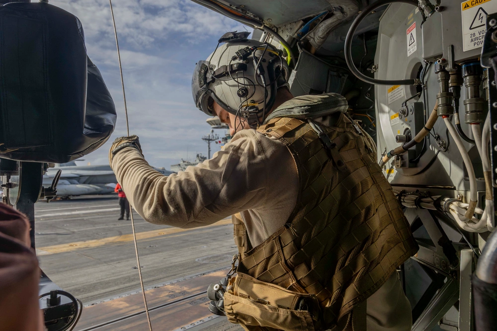 Abraham Lincoln conducts a fueling-at-sea with Henry J. Kaiser