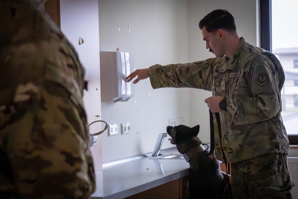 Handler, detection dog team up for 52nd Security Forces Squadron certification in time for the holidays