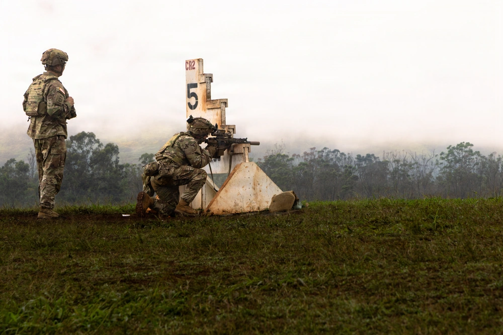 U.S. Army Soldiers from the 25th Infantry Division, engage a target during an M7 weapon qualification at Schofield Barracks, Hawaii, Jan. 30, 2026. As part of Transformation in Contact 2.0, the Tropic Lightning Division has started fielding, training and qualifying Soldiers on the Army’s next-generation rifle.