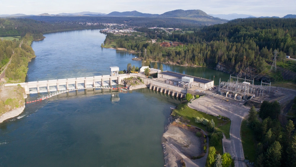 Aerial photo of Albeni Falls Dam, located in Oldtown, Idaho. Authorized for construction under the Flood Control Act of 1950, in response to the 1948 flood that swept over the river valleys of the Columbia Basin. The operating project's authorized purposes include flood risk management, hydropower generation, navigation, fish and wildlife conservation and recreation.