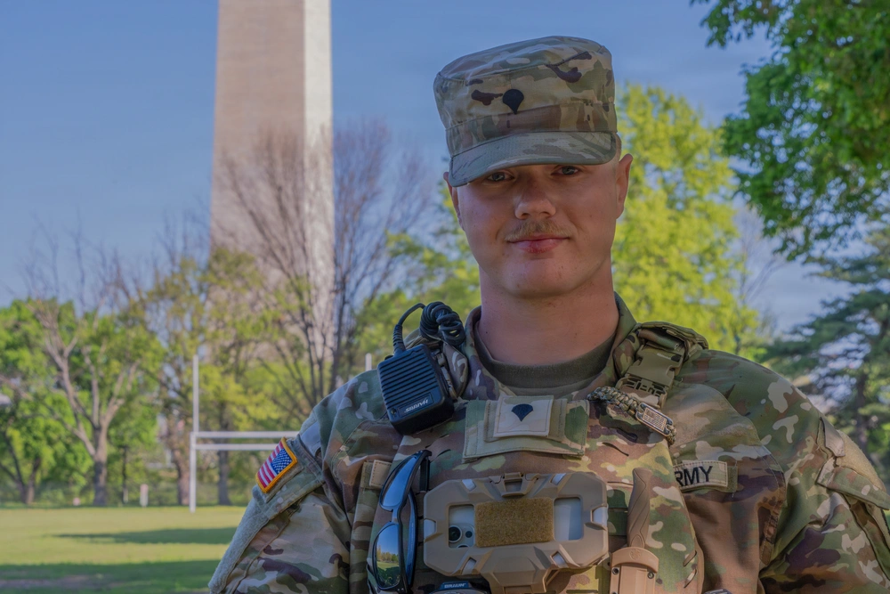 DVIDS - Images - A Mississippi National Guard Soldier helps a member of ...