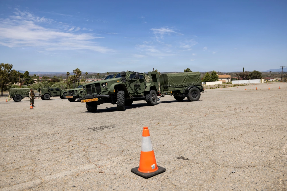 U.S. Marines take the wheel during JLTV operator course