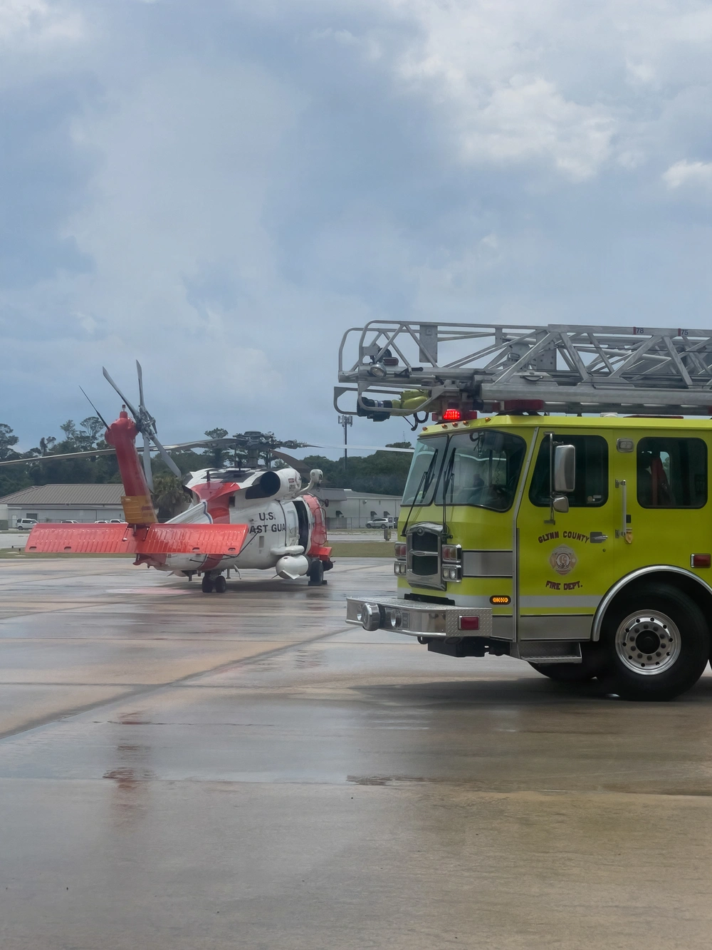 A Coast Guard Air Station Clearwater helicopter crew transfers a 56-year-old man to EMS at St. Simons Island Airport in Georgia, June 12, 2026. The man was medevaced from a fishing vessel 92 miles offshore Brunswick, Georgia. (U.S. Coast Guard photo, courtesy Air Station Clearwater)