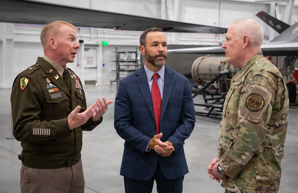 Army Brig. Gen. William C. Hannan, Jr., commanding general of Joint Task Force Castle (left), and Pete Sturdivant, director of Intercontinental Ballistic Missile Infrastructure for the U.S. Air Force Nuclear Weapons Center (center), speak with U.S. Air Force General Dale R. White, director, Critical Major Weapon Systems. The U.S. Army Corps of Engineers and the U.S. Air Force activated Joint Task Force Castle in a ceremony at Hill Air Force Base, Utah, on July 16, 2026.